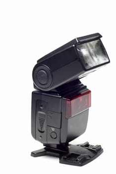 Speedlight flash isolated on a white background.