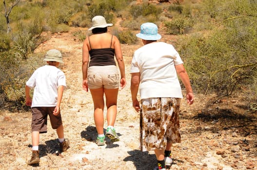 Senior woman boy and grandmother climbing