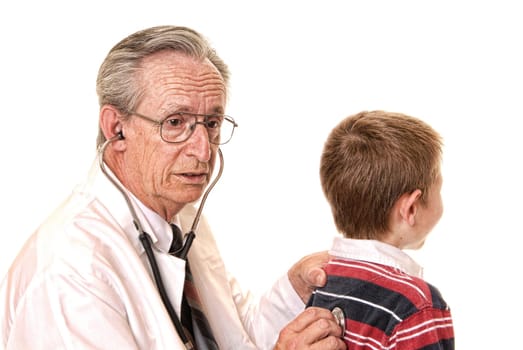 Senior doctor physician isolated on white with young boy patient