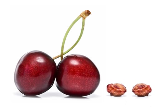 Fresh cherries isolated on a white background.