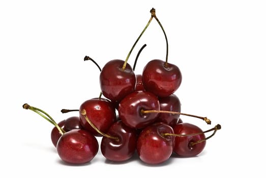 Fresh cherries isolated on a white background.