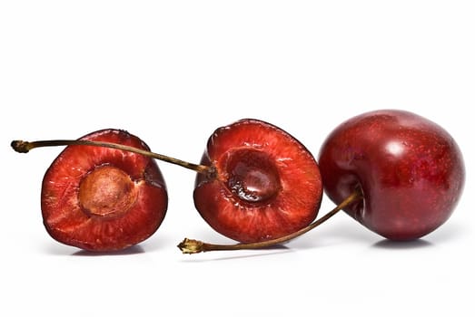 Fresh cherries isolated on a white background.