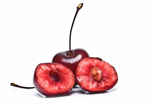 Fresh cherries isolated on a white background.
