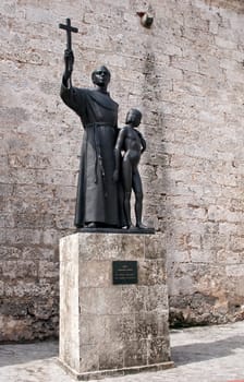Momunent to Evangelization in Havana, Cuba. Friar Junipero Serra with indian boy.