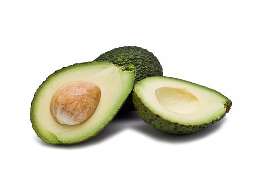 Fresh avocados isolated on a white background.