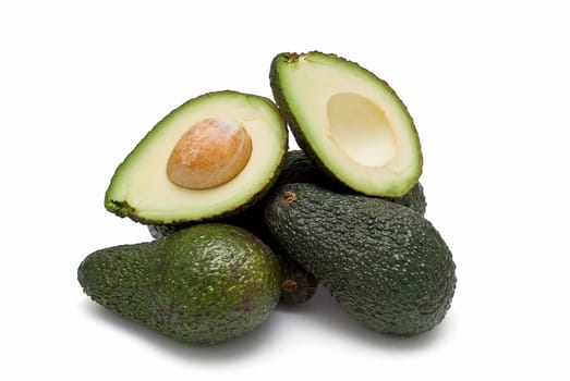 Fresh avocados isolated on a white background.