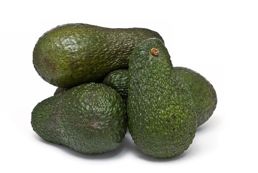 Fresh avocados isolated on a white background.