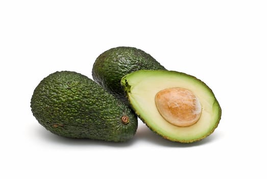 Fresh avocados isolated on a white background.