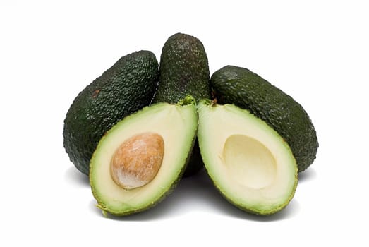 Fresh avocados isolated on a white background.