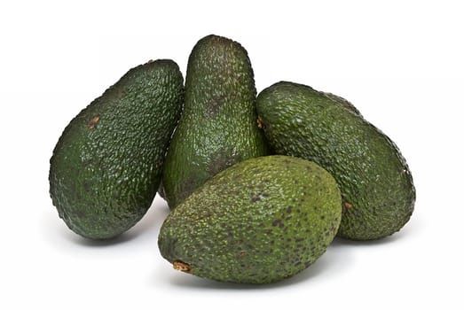 Fresh avocados isolated on a white background.