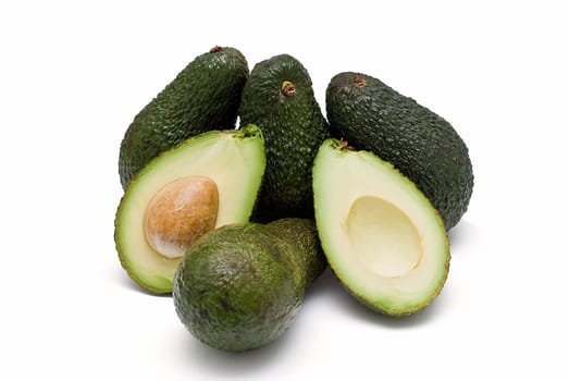 Fresh avocados isolated on a white background.