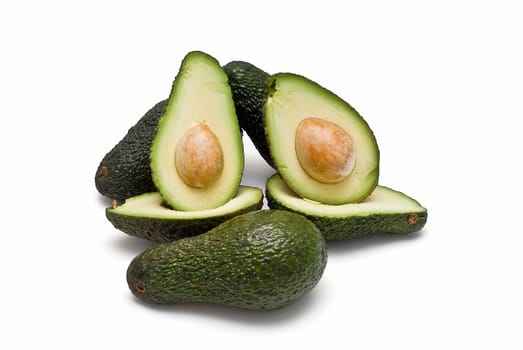 Fresh avocados isolated on a white background.