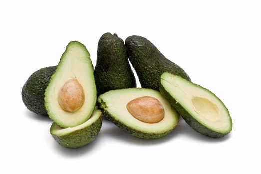 Fresh avocados isolated on a white background.