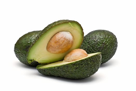 Fresh avocados isolated on a white background.