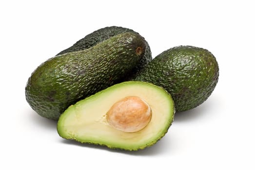 Fresh avocados isolated on a white background.