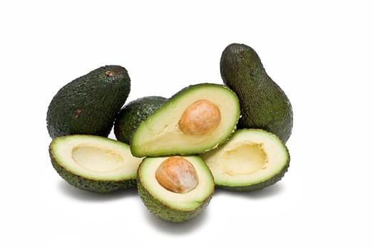 Fresh avocados isolated on a white background.