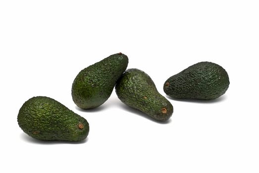 Fresh avocados isolated on a white background.