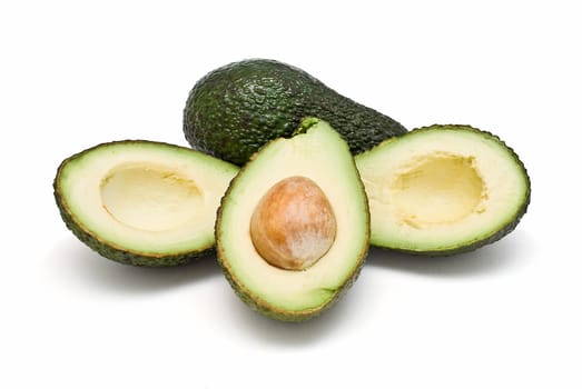 Fresh avocados isolated on a white background.
