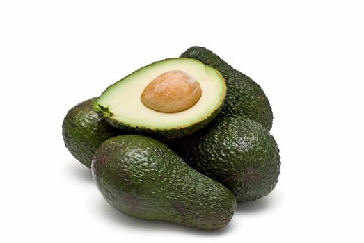 Fresh avocados isolated on a white background.