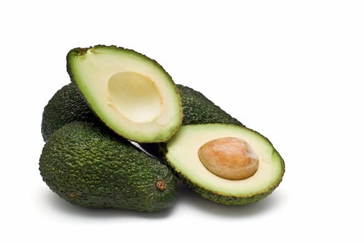 Fresh avocados isolated on a white background.