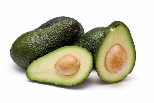 Fresh avocados isolated on a white background.