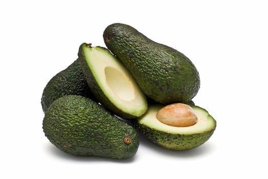 Fresh avocados isolated on a white background.
