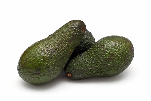 Fresh avocados isolated on a white background.