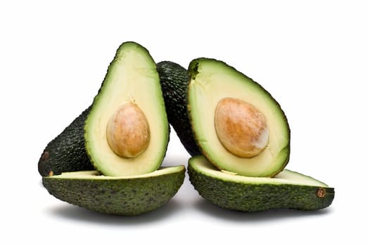 Fresh avocados isolated on a white background.