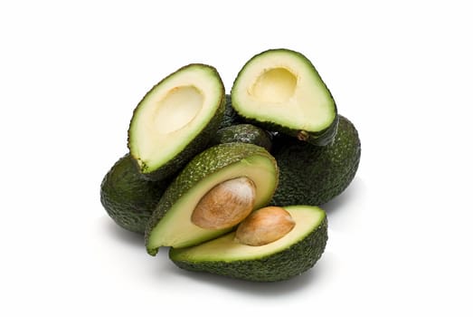Fresh avocados isolated on a white background.
