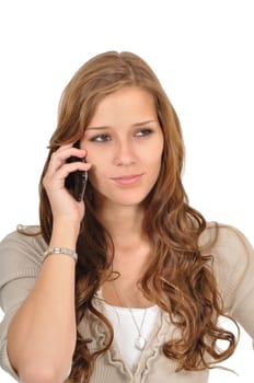 Young woman talking on the phone thoughtfully