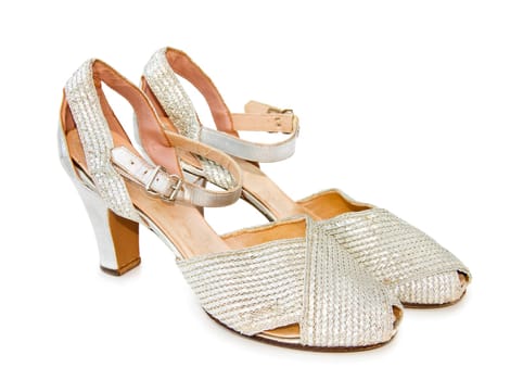 Original vintage evening leather silver shoes from the 1930s. Isolated over white backround.