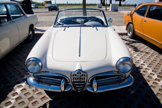 Close view of an Italian classic seventies car parked.