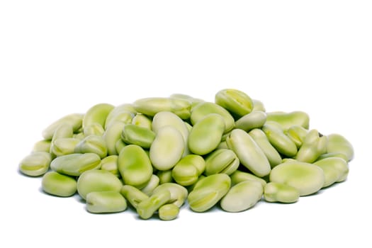 Close up view of some broad beans isolated on a white background.