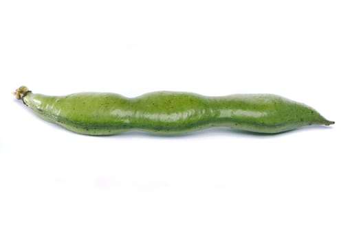 Close up view of some broad beans isolated on a white background.