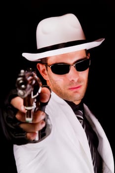 View of a white suit gangster man holding a gun.