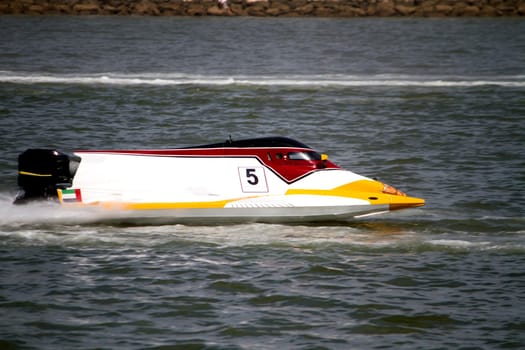 View of a powerboat race on a lake in Portugal.