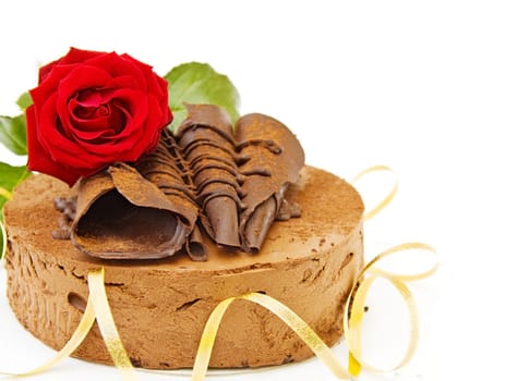 Happy birthday delicious toffee cake with red rose and golden ribbons. Isolated over white background.