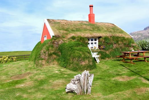 Iceland Borgarfjordur Lindarbakki hairy house with grass on the walls and roof