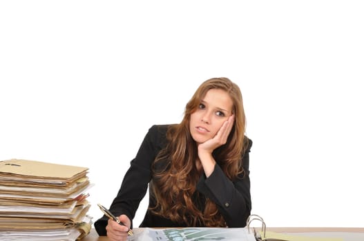 Businesswoman dreaming at desk