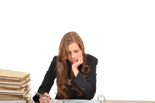 Businesswoman at desk thinking