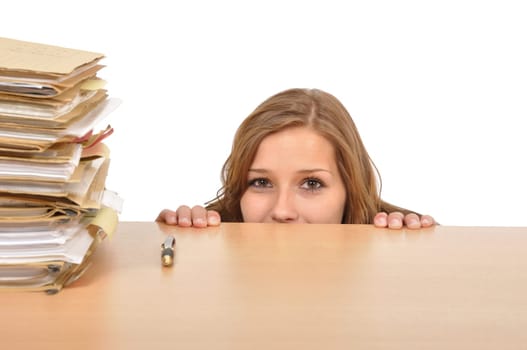 Businesswoman kneeling behind desk