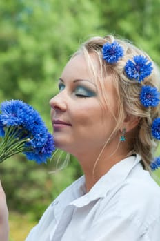Outdoor shoting of beautiful young caucasian woman