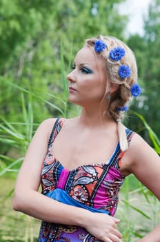 Outdoor shoting of beautiful young caucasian woman
