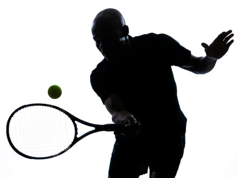 man african afro american playing tennis player forehand on studio isolated on white background