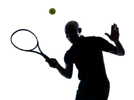 man african afro american playing tennis player forehand on studio isolated on white background