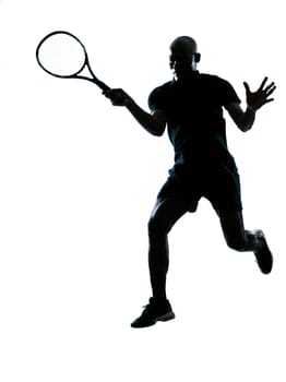 man african afro american playing tennis player forehand on studio isolated on white background