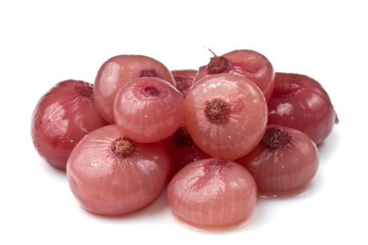 Pickled onion pile isolated over white background