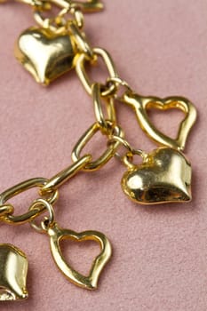 Nice golden bracelet in heart shape