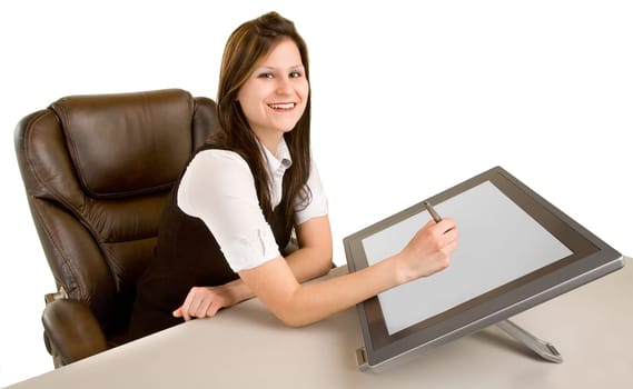 A young woman is drawing on a digital tablet.