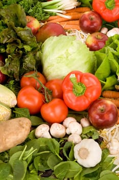 This is a close-up of vegetables and apples.